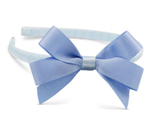 Load image into Gallery viewer, Brighten up any outfit with this fantastic baby blue grosgrain ribbon, super flexible headband. Whether smart or casual our headband will suit the need. So comfortable she&#39;ll forget she has it on!